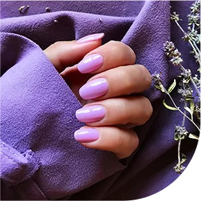 cropped-hand-woman-with-purple-nail-polish-by-flowers-fabric